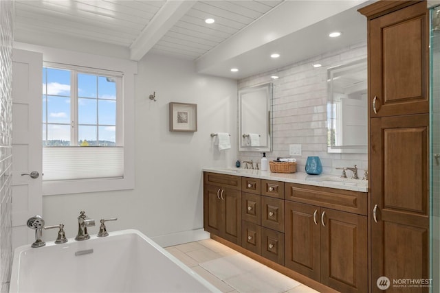 7501 Stinson Ave, Gig Harbor, WA 98335 - full bath featuring a freestanding bath, a sink, beamed ceiling, and double vanity
