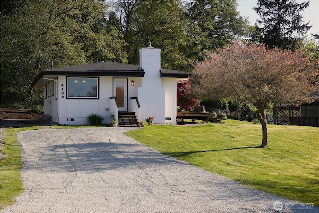 4182 Scatchet View Dr, Clinton, WA 98236 - view of front facade with a front lawn, crawl space, a chimney, and aphalt driveway
