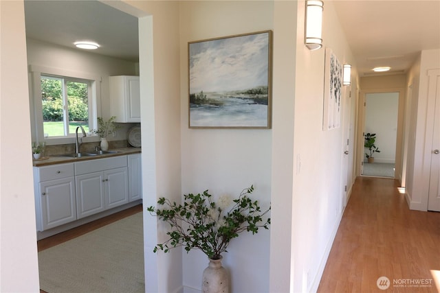 4182 Scatchet View Dr, Clinton, WA 98236 - corridor featuring a sink and light wood-style floors