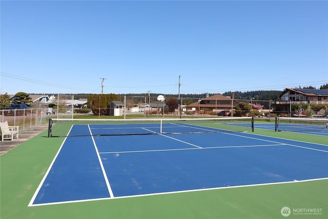 4182 Scatchet View Dr, Clinton, WA 98236 - view of tennis court featuring fence