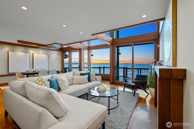 3103 Alki Ave SW, Seattle, WA 98116 - living room with a water view, wood finished floors, and recessed lighting
