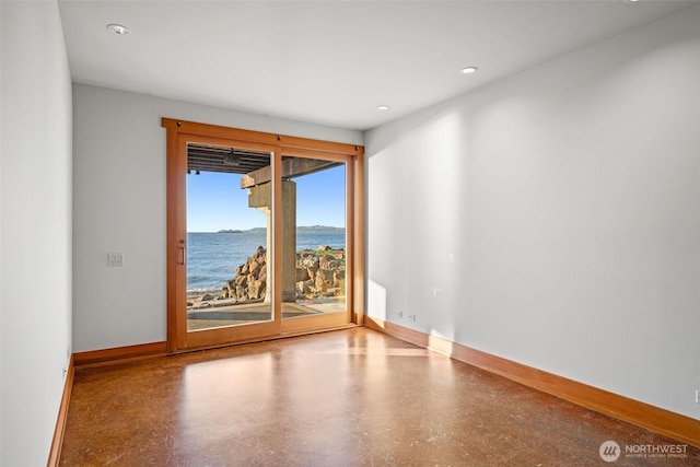 3103 Alki Ave SW, Seattle, WA 98116 - empty room featuring a water view, baseboards, and recessed lighting