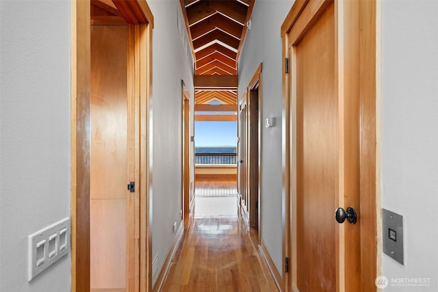 3103 Alki Ave SW, Seattle, WA 98116 - hall with wood finished floors, lofted ceiling, and baseboards