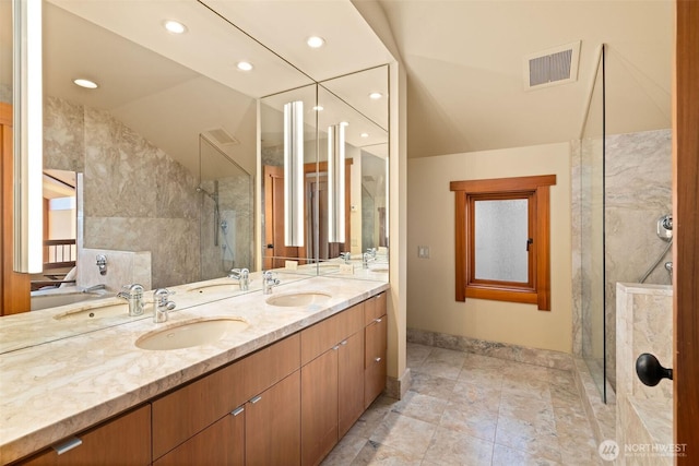 3103 Alki Ave SW, Seattle, WA 98116 - full bath featuring walk in shower, double vanity, baseboards, recessed lighting, and lofted ceiling