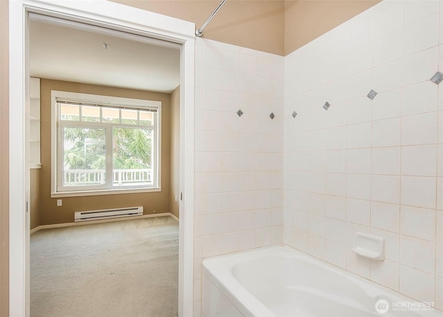 full bathroom with a baseboard radiator, bathing tub / shower combination, and baseboards