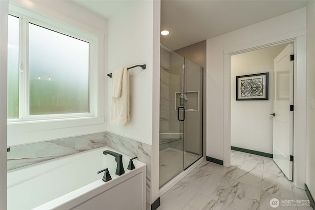 2302 S Royal Ct, Ridgefield, WA 98642 - bathroom featuring a garden tub, a stall shower, marble look tile flooring, recessed lighting, and baseboards