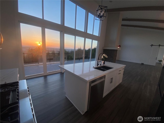 20555 Benson Ridge Ln, Mount Vernon, WA 98274 - kitchen featuring dishwasher, dark wood-style floors, white cabinetry, a center island, and pendant lighting