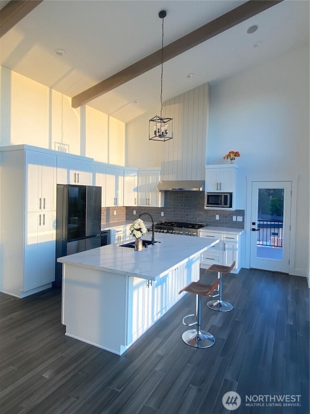 20555 Benson Ridge Ln, Mount Vernon, WA 98274 - kitchen featuring stainless steel microwave, high vaulted ceiling, backsplash, dark wood finished floors, and smart refrigerator