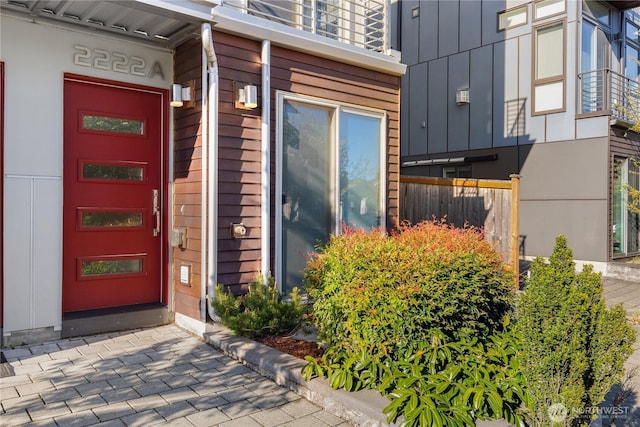 doorway to property with board and batten siding