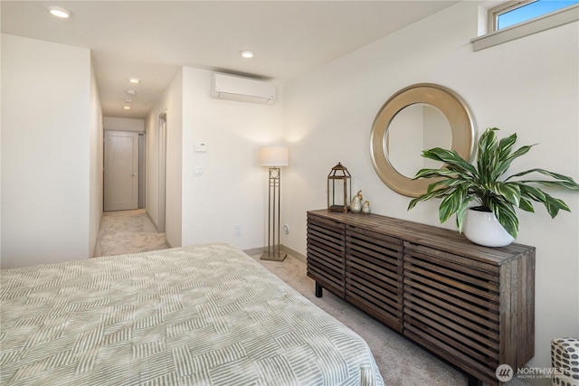 bedroom featuring an AC wall unit, recessed lighting, and carpet flooring