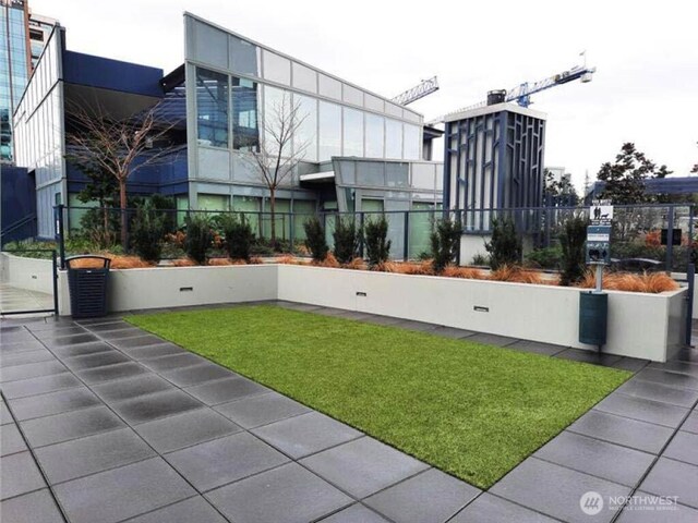 188 Bellevue Way NE Unit 303, Bellevue, WA 98004 - view of yard featuring fence