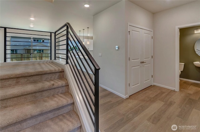 18213 35th Avenue Ct E, Tacoma, WA 98446 - stairway featuring wood finished floors and baseboards