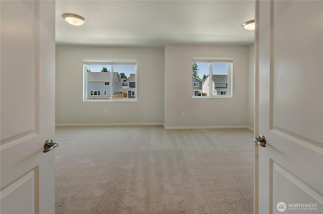 18213 35th Avenue Ct E, Tacoma, WA 98446 - unfurnished room featuring carpet floors and healthy amount of natural light