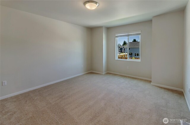 18213 35th Avenue Ct E, Tacoma, WA 98446 - unfurnished room with light colored carpet
