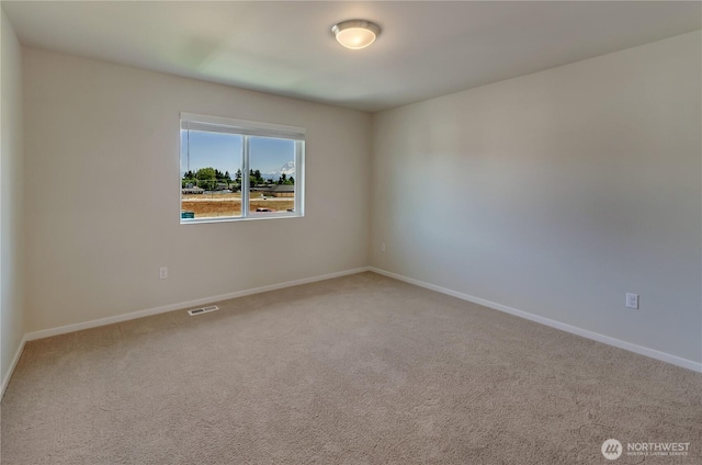 18213 35th Avenue Ct E, Tacoma, WA 98446 - spare room featuring carpet floors and baseboards