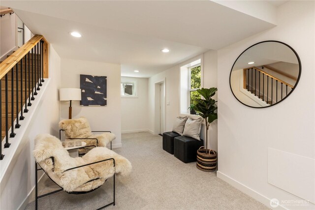living area with recessed lighting, carpet, stairs, and baseboards