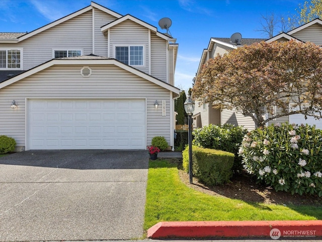 17581 110th Ln SE Unit 3, Renton, WA 98055 - view of front of property with concrete driveway and a garage