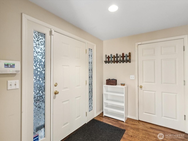 17581 110th Ln SE Unit 3, Renton, WA 98055 - foyer featuring wood finished floors and baseboards