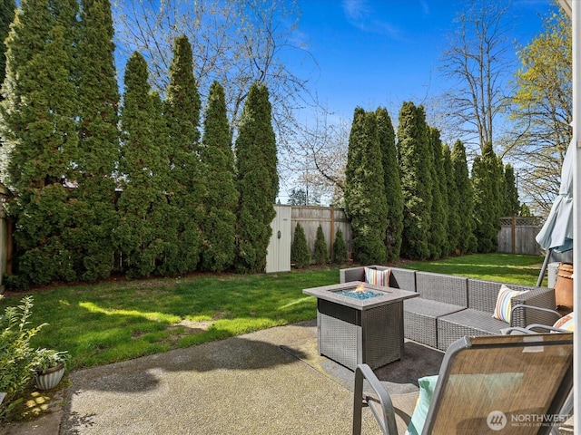 17581 110th Ln SE Unit 3, Renton, WA 98055 - view of patio / terrace with an outdoor living space with a fire pit