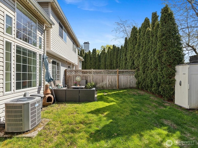 17581 110th Ln SE Unit 3, Renton, WA 98055 - view of yard featuring cooling unit and outdoor lounge area