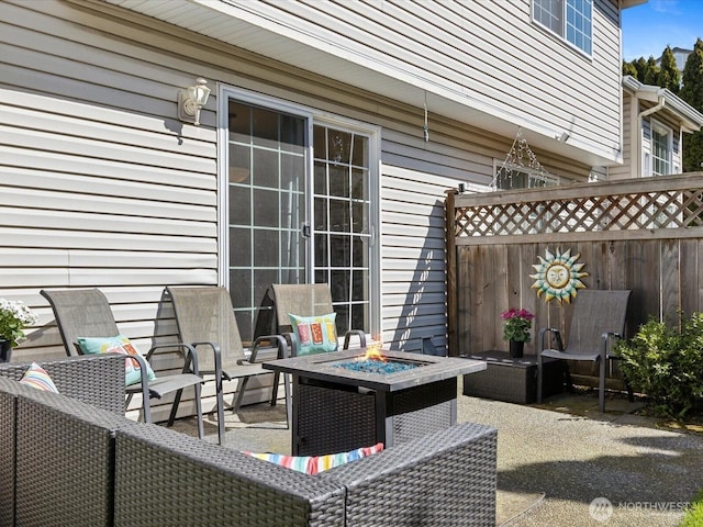 17581 110th Ln SE Unit 3, Renton, WA 98055 - view of patio with a fire pit and fence