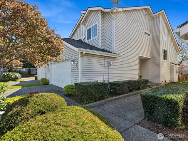 17581 110th Ln SE Unit 3, Renton, WA 98055 - view of front of property with asphalt driveway and an attached garage