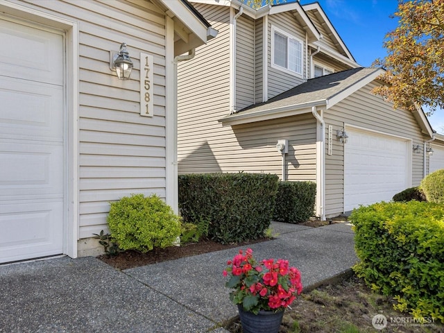 17581 110th Ln SE Unit 3, Renton, WA 98055 - view of side of property featuring a garage