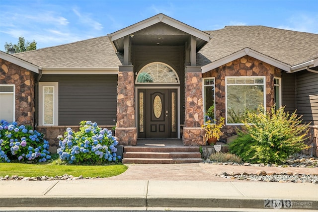 2840 Mikayla Ln, East Wenatchee, WA 98802 - entrance to property featuring stone siding and roof with shingles