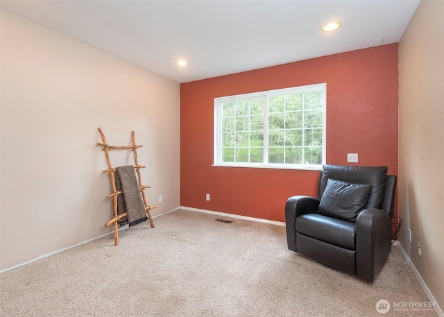 living area featuring recessed lighting, carpet floors, visible vents, and baseboards