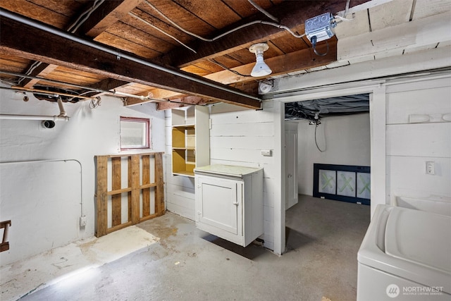below grade area featuring washer / dryer