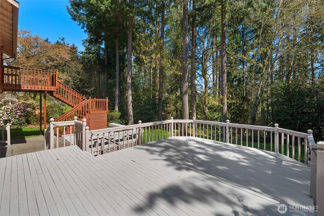 wooden deck featuring stairway