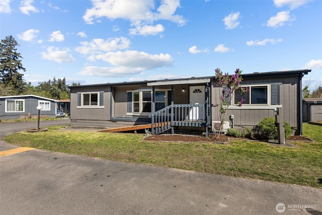 11519 21st Ave E Unit 84, Tacoma, WA 98445 - manufactured / mobile home featuring a front yard