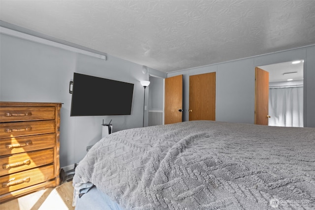 11519 21st Ave E Unit 84, Tacoma, WA 98445 - bedroom with a textured ceiling