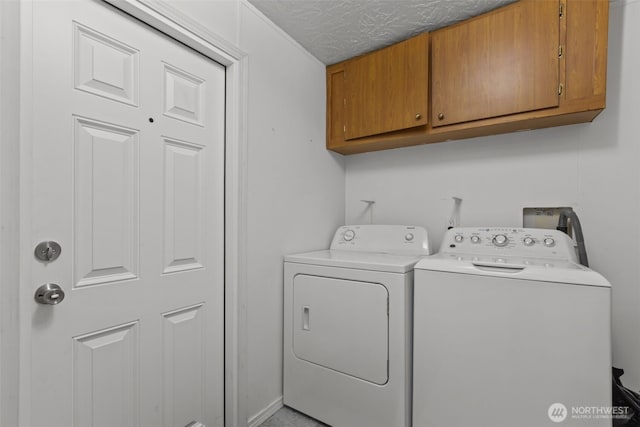 11519 21st Ave E Unit 84, Tacoma, WA 98445 - washroom with cabinet space and washing machine and dryer