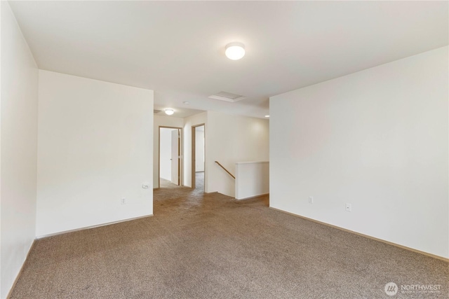 unfurnished room with carpet flooring
