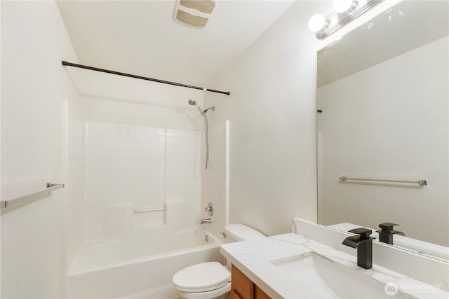 full bath featuring toilet, vanity, and tub / shower combination