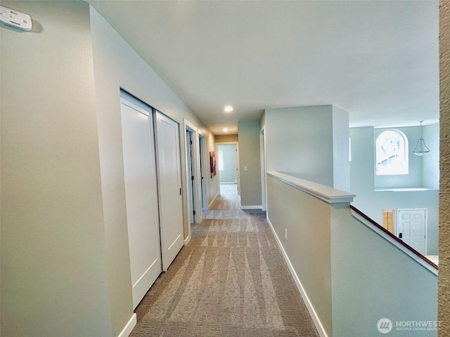 18126 SE 246th St, Covington, WA 98042 - corridor featuring baseboards, an upstairs landing, and carpet