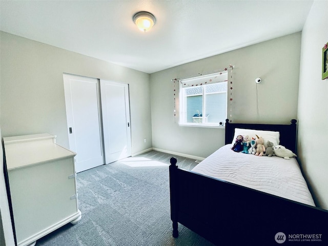 18126 SE 246th St, Covington, WA 98042 - carpeted bedroom featuring a closet and baseboards