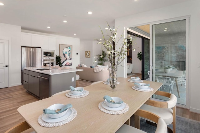 25525LOT1 204th Pl SE, Covington, WA 98042 - dining area featuring recessed lighting and light wood finished floors