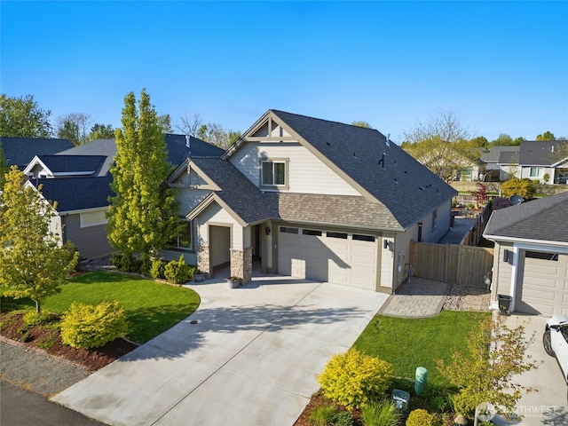 308 Chardonnay Ct, Walla Walla, WA 99362 - craftsman inspired home featuring driveway, a shingled roof, fence, a front yard, and a residential view