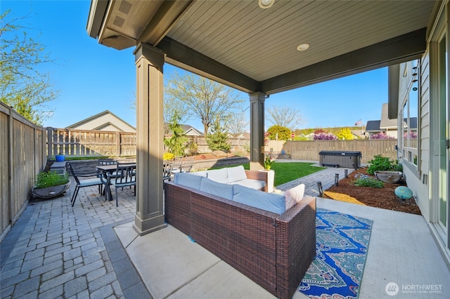 308 Chardonnay Ct, Walla Walla, WA 99362 - view of patio / terrace with outdoor dining area, an outdoor living space, a hot tub, and a fenced backyard