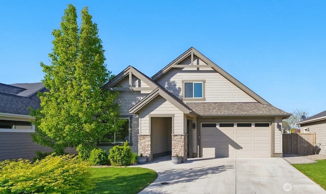 308 Chardonnay Ct, Walla Walla, WA 99362 - craftsman-style house with a garage, driveway, a shingled roof, and fence