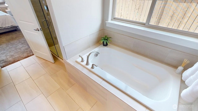 308 Chardonnay Ct, Walla Walla, WA 99362 - ensuite bathroom featuring connected bathroom, a shower stall, a garden tub, and tile patterned floors