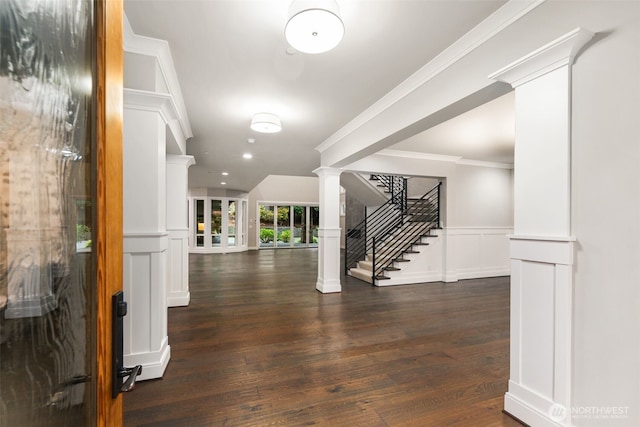 4229 95th Ave NE, Yarrow Point, WA 98004 - interior space with a decorative wall, stairs, wainscoting, dark wood-style flooring, and ornate columns
