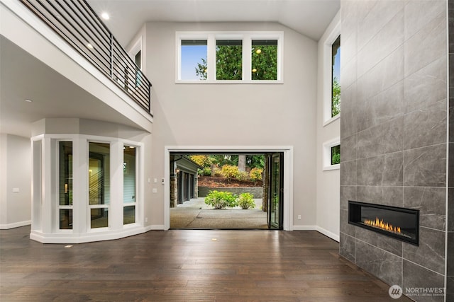 4229 95th Ave NE, Yarrow Point, WA 98004 - foyer with baseboards, a wealth of natural light, wood finished floors, and a tiled fireplace