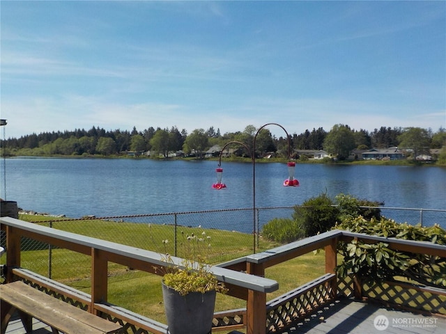 view of water feature with fence