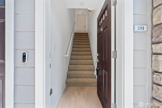 10757 NE Red Wing Way Unit 201, Hillsboro, OR 97006 - staircase with baseboards and wood finished floors