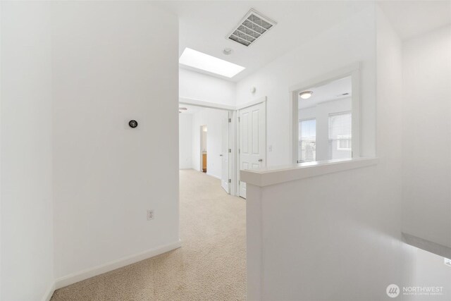 10757 NE Red Wing Way Unit 201, Hillsboro, OR 97006 - hall with a skylight and light carpet