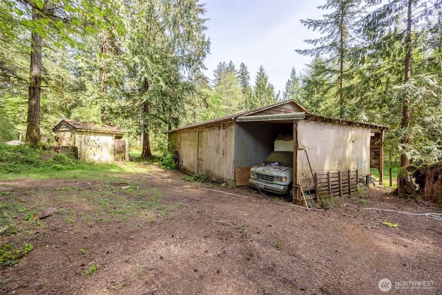 7212 Delphi Rd SW, Olympia, WA 98512 - view of pole building featuring a forest view