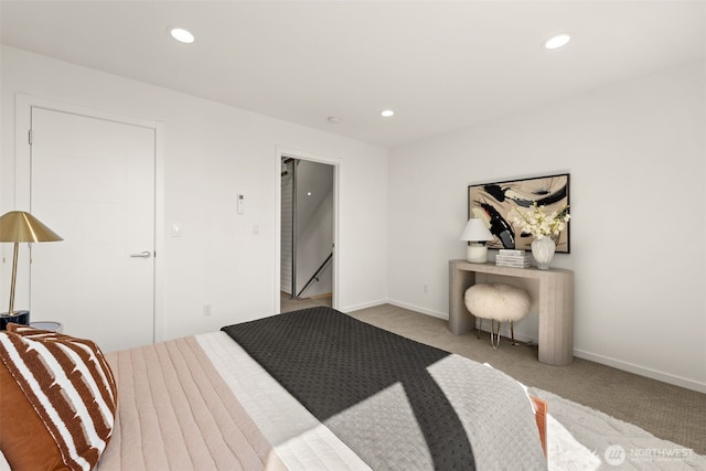 carpeted bedroom with recessed lighting and baseboards